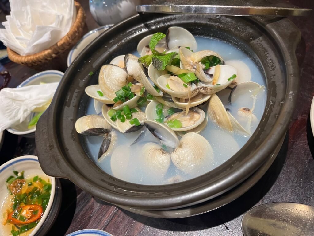 Clams in a light broth served during dinner in Hoi An