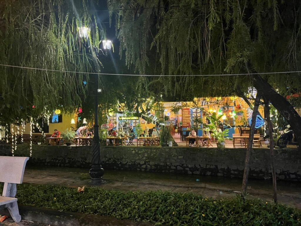 Restaurants and lights along the Hoi An riverside at night