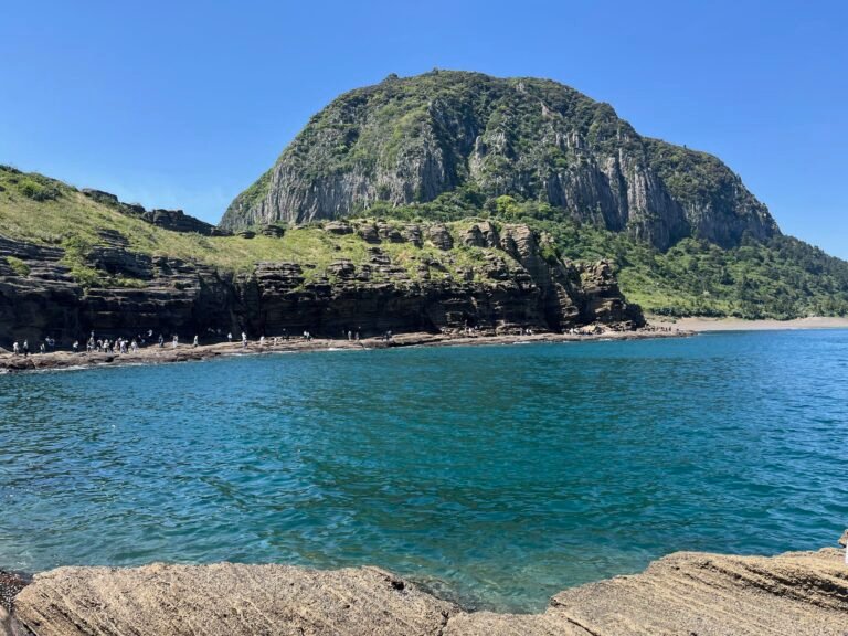Wide view of Yongmeori Coast and Sanbangsan Mountain in Jeju